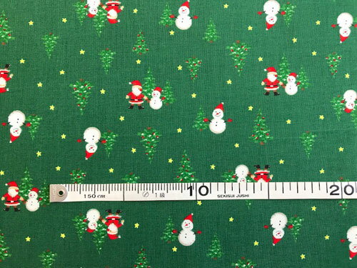 パッチワーク生地クリスマスプリント緑地に雪だるまとサンタさんとツリー