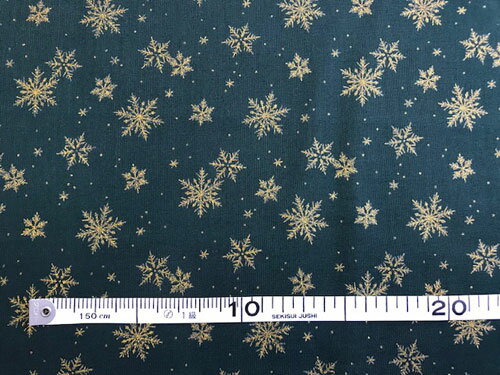 パッチワーク 生地 クリスマスプリント グリーン地にゴールドの雪の結晶柄 ：数量1＝10cm