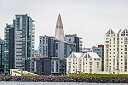 【中古】【輸入品 未使用】Posterazzi Modern apartment buildings surrounding Hallgrimskirkja Church Reykjavik Iceland Poster Print (36 x 12) 141［並行輸入］