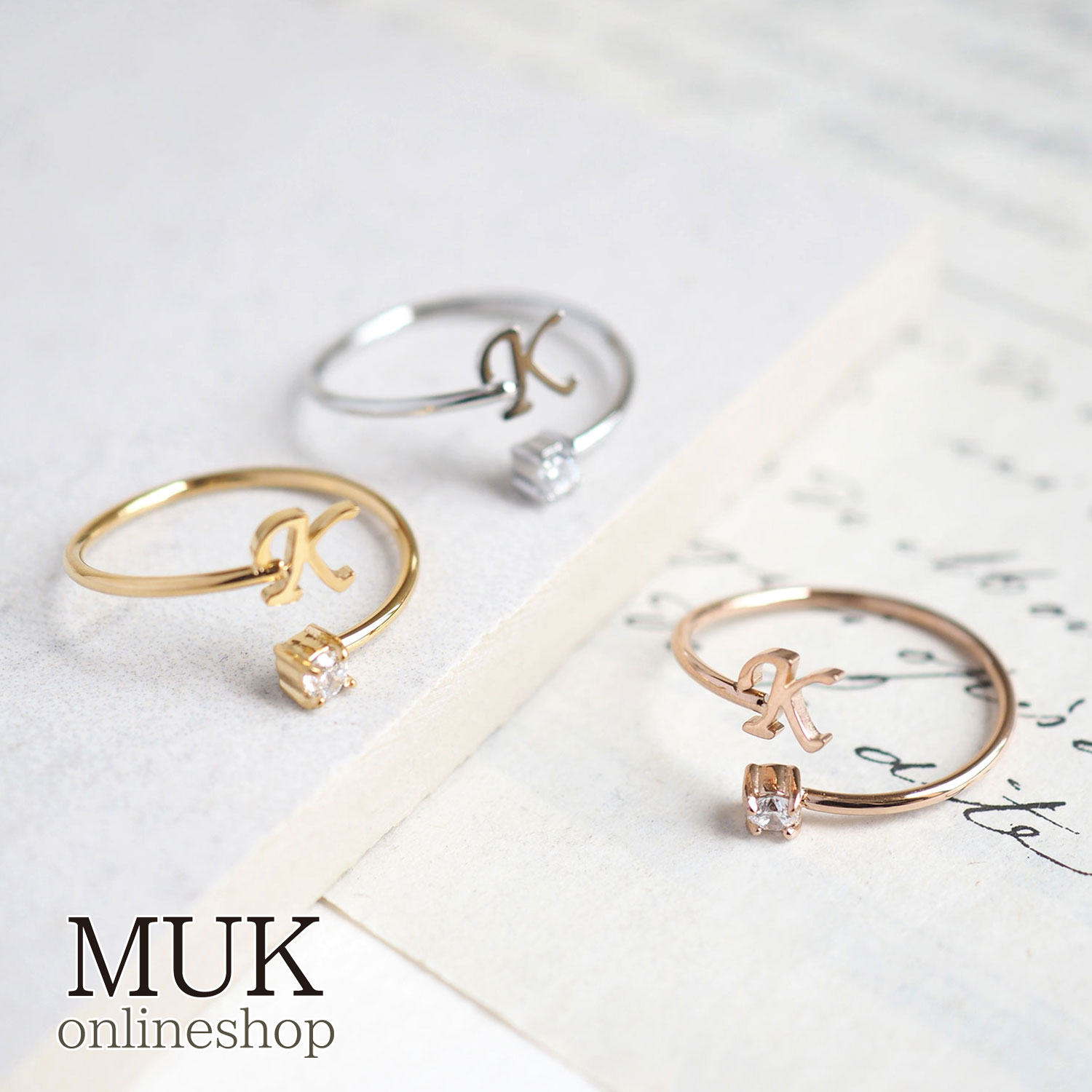 リング イニシャル K k シルバー ゴールド ピンクゴールド ステンレス 金属アレルギー シンプル 華奢 重ね付け 上品 muk ギフトのサムネイル