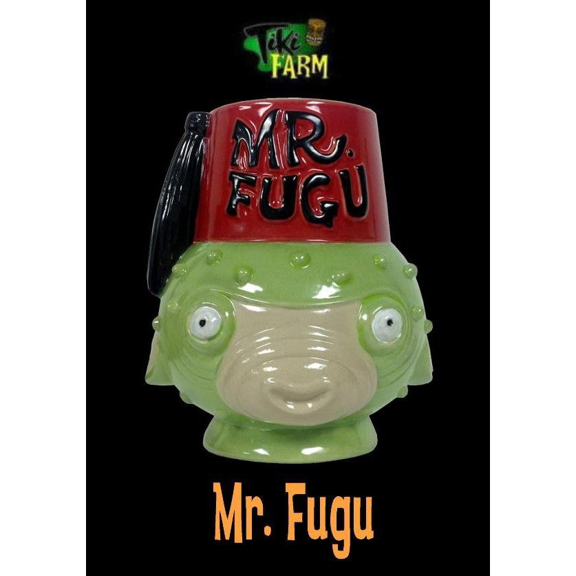 “Mr. Fugu” designed by Tiki Farm former Art Director, legendary lowbrow artist The Pizz.Whimsical in nature, both Mr. Fugu and Lil’ Fugu feature 2 left-of-center elements often times found in Tiki design… the first being the classic “Fez” and the second being the loveable “Fugu” (or Puffer Fish).Glazed in brilliant green, burgundy, tan, black and white, Mr. Fugu measures 5 3/8” in height and has a 20 ounce capacity.※1体の価格ですThe PIZZのデザイン、もしかしたらTiki Farm最後の作品になるかと思われる「Mr. Fugu 」マグ!エメラルド・グリーンのキュートでポップなシュリナースタイルトルコ帽をかぶったバーテンダー・スタイルのハリセンボン・デザインです。ショットグラスも生産されてますが、こちらはレギュラータイプのマグ!デスクトップ等に単体でさりげなく飾ってもグッ!高さ　14cmTiki Farm社製Tiki Farm社製ティキ&ハワイアン/TIKI & HAWAIIAN ティキ・ファーム/TIKI FARMトレーダー・ヴィックス/TRADER VIC'S ティキ・マグ/TIKI MUG