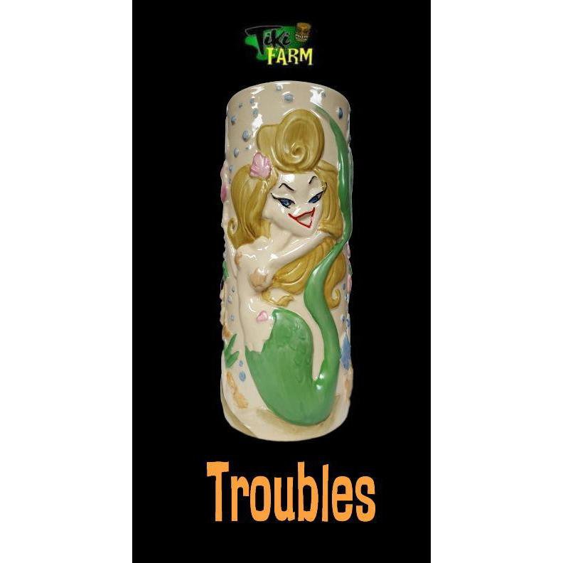 ※1個の価格です。Tiki Farmの2016年リリース・ロウブローアーティスト Candy Weilデザインによる「Troubles」です。海中の魚 & Tikiを誘惑するセクシーなマーメイドをモチーフにした直線タンブラー!ティキファームとしては珍しいポップでカートゥーン風なデザインですね。同時リリースのBubblesと対になったデザインです。高さ:17.5cmTiki Farm社製ティキ&ハワイアン/TIKI & HAWAIIAN ティキ・ファーム/TIKI FARMトレーダー・ヴィックス/TRADER VIC'S ティキ・マグ/TIKI MUG
