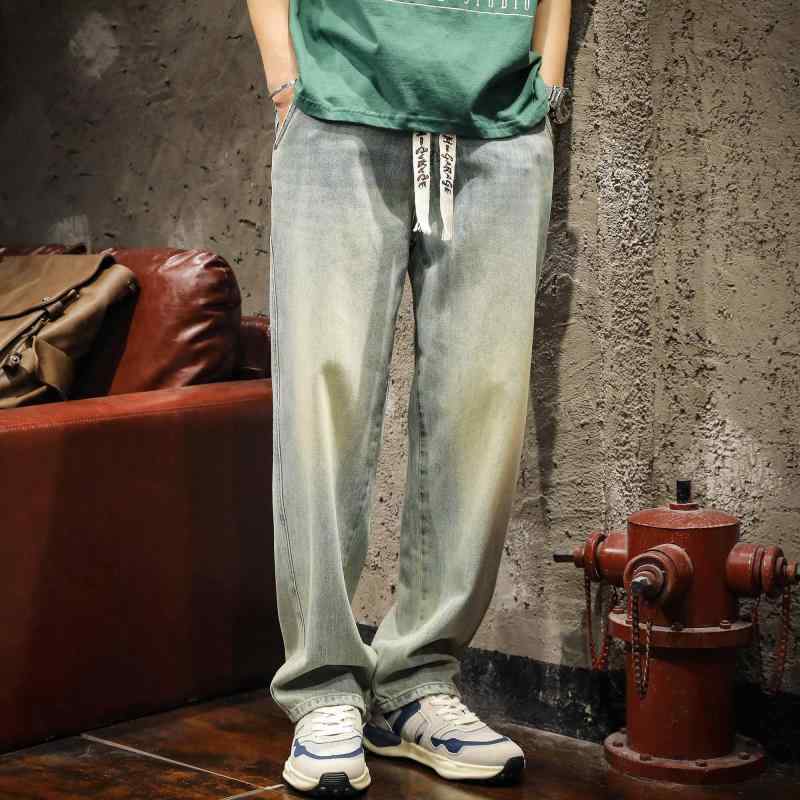 デニムパンツ メンズ アメリカ ストリート ジーンズ 春 雰囲気 レトロ ウォッシュ 加工 ダメージ 加工 イエロー 泥 染め ドローストリング ストレート ロング パンツ ジッパー デニム ファッション かっこいい カジュアル