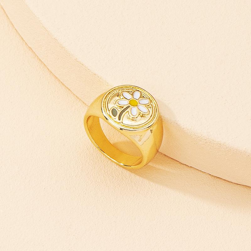 リング レディース ゴールド フラワー デイジー エナメル加工 シンプル 個性的 クール ボリューム感 欧米風 インスタ映え 電気メッキ加工 合金