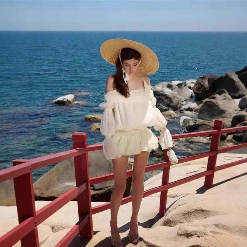 ワンピース レディース 夏 リゾート ビーチ バカンス トレンド フリンジ シフォン シャーリング ノースリーブ ミニ丈 オフショルダー フレア アイボリー 大人可愛い フェミニン ポリエステル素材