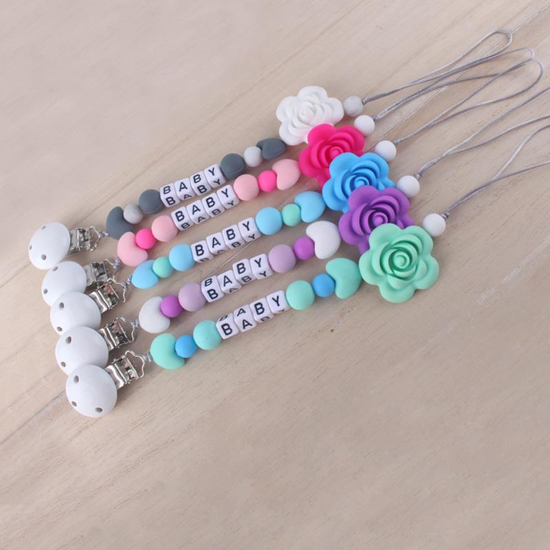 おしゃぶりチェーン ベビー 落下防止 歯固め付き シリコン製 クリップ ホルダー 花柄 プラスチック 木製 赤ちゃん 出産祝い プレゼント かわいい 新生児(x3)