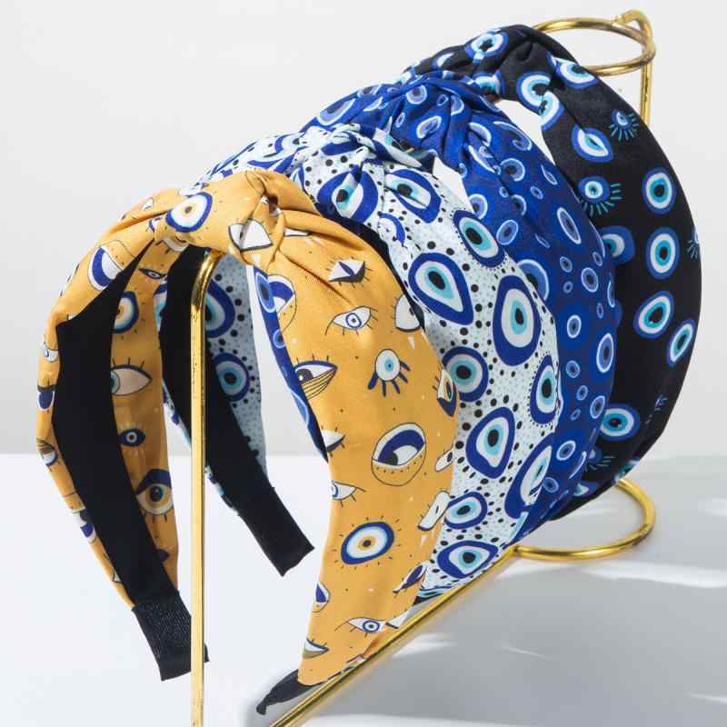 ・素材: 布・形状: ヘアバンド・加工方法: プリント・カラー展開: ブラック、白青、ロイヤルブルー、イエロー・流行要素: 目・スタイル: 個性的・スタイル分類: 個性トレンド・カテゴリ: ヘッドウェア・対象: 女性・流行要素分類: 顔のパーツ/表情