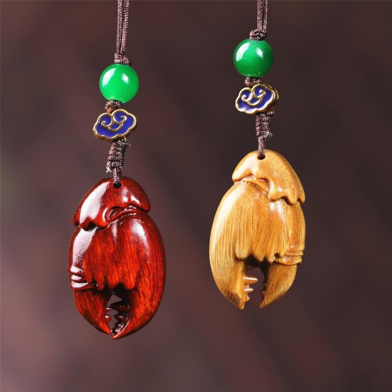 木彫り 置物 紫檀 緑檀 紅木 カニ 蟹爪 金運招来 財運アップ 招福 開運 縁起物 ラッキーアイテム 掌飾り 吊り飾り ペンダント