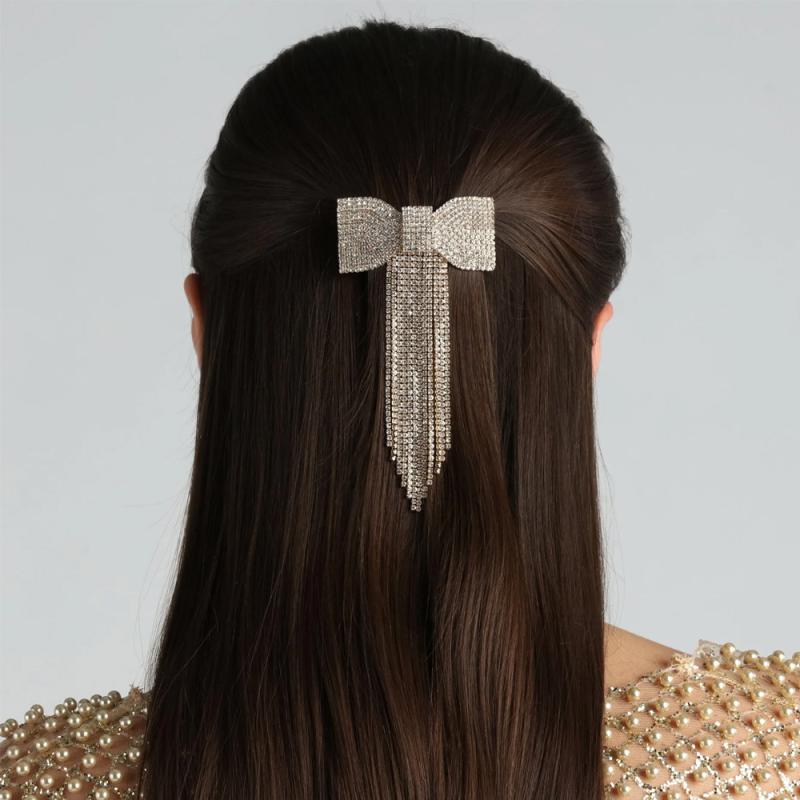 ・カテゴリ: ヘッドアクセサリー・素材: ラインストーン・加工方法: 電解メッキ・ヘアクリップ種類: スプリングクリップ・カラー展開: ゴールド、シルバー・人気要素: リボン、タッセル・人気要素分類: 形状、柄・スタイル: ファッションOL・スタイル分類: ファッション通勤