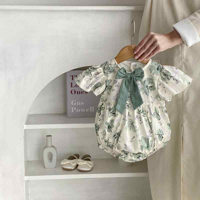 ロンパース ベビー 女の子 プリント リボン フリル袖 半袖 薄手 綿100% 安心安全 前開き スナップボタ..