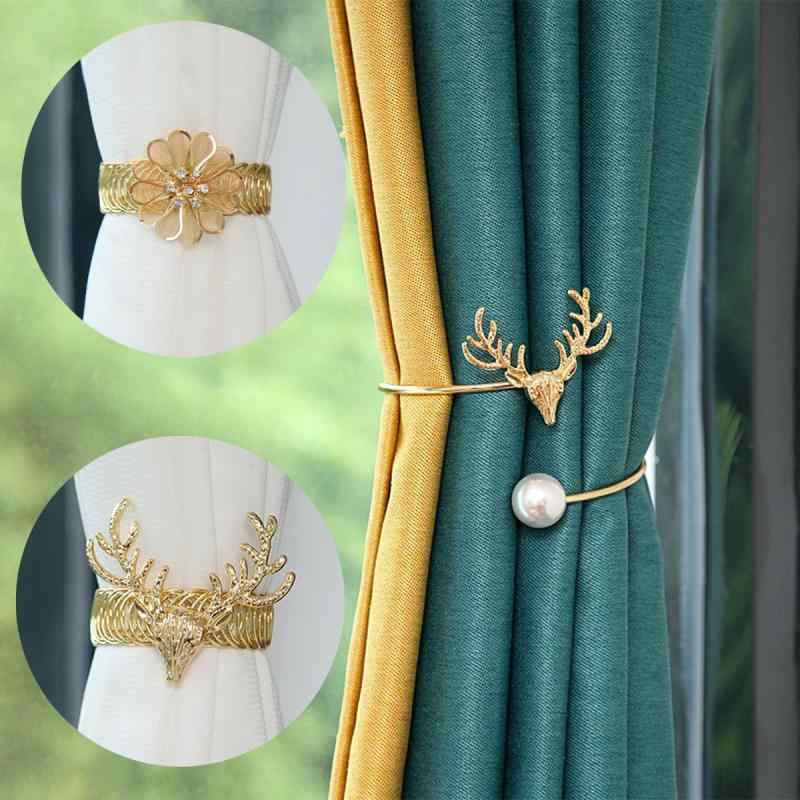 ・カテゴリ: カーテンタッセル・スタイル: モダンシンプル・主な素材: 金属・カラー展開: スプリングリング鹿ヘッド（小）ゴールド、スプリングリング鹿ヘッド（小）シルバー、スプリングリング鹿ヘッド（大）ゴールド、スプリングリング小花J ゴールド、スプリングリング小花J シルバー、スプリングリング小花0 ゴールド、スプリングリング小花0 シルバー