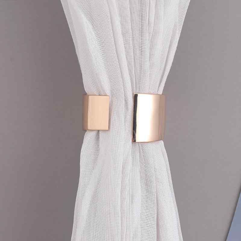 カーテンタッセル アシンメトリー 中央開口 結び帯 金属製 モダンシンプルデザイン おしゃれなカーテン留め ブラッシュドゴールド ミラーゴールド ミラーシルバー インテリア雑貨