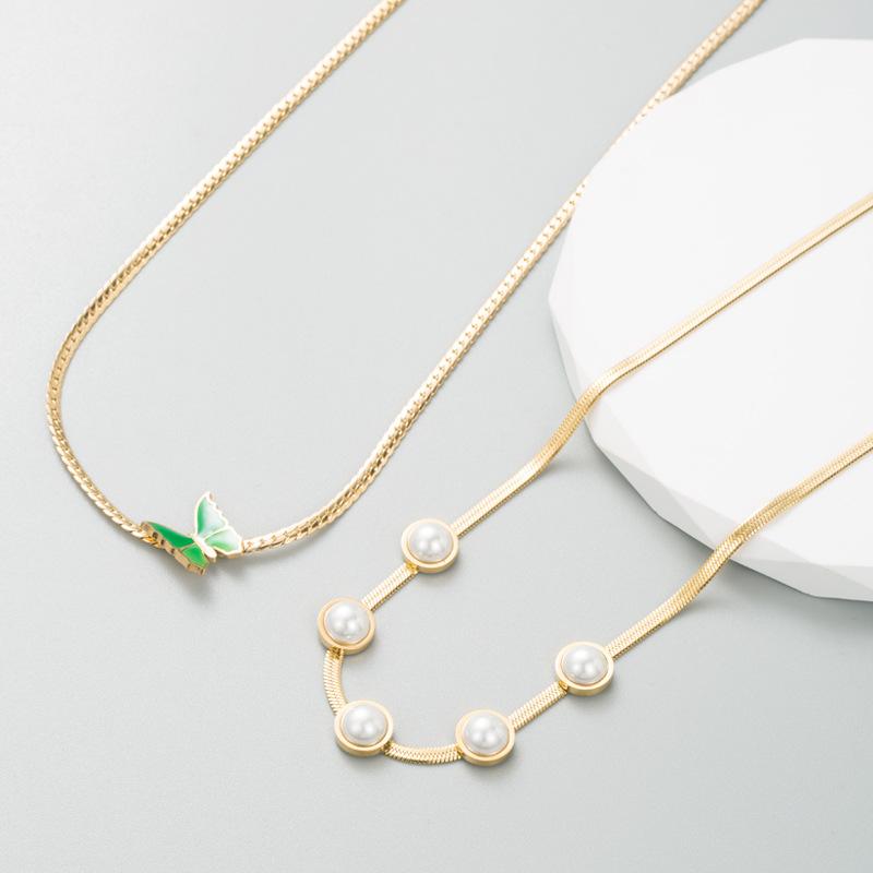 ネックレス レディース 長さ調整可能 韓国ファッション 高級感 エレガント 大人かわいい 合金 パール ジルコニア 蝶々 バタフライ モチーフ エナメル加工 スネークチェーン 通勤用 オフィス 普段使い
