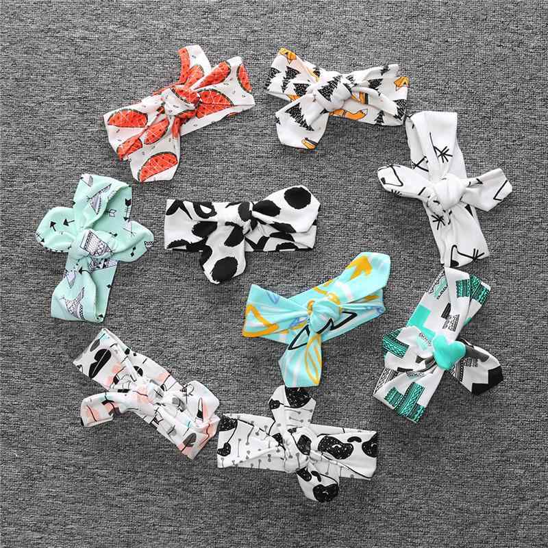 ヘアバンド キッズ ベビー かわいい カートゥーン柄 欧米風 リボン 蝶結び 結び コットン素材 ヘアーバ..