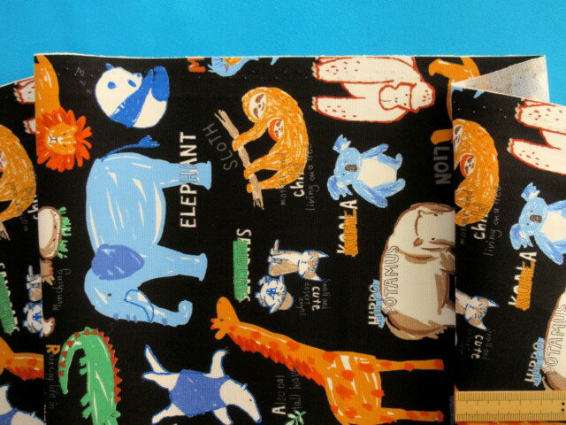 綿プリントオックス生地動物・黒×水（110cm幅　1m）