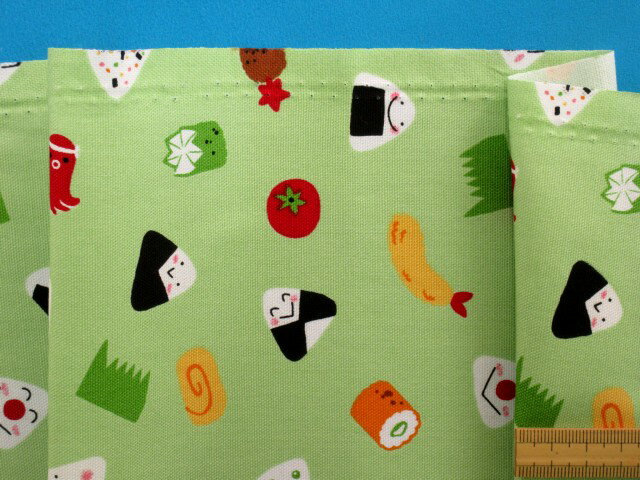 綿プリントオックス生地おにぎり・薄グリン（110cm幅　1m）