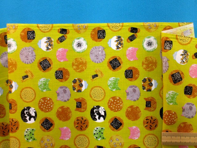 綿プリント生地ネコ/せんべい・イエロー系（105cm幅　2m）