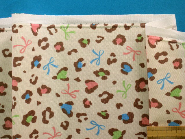 綿プリントオックス生地アニマル/リボン・アイボリー（110cm幅　2m）