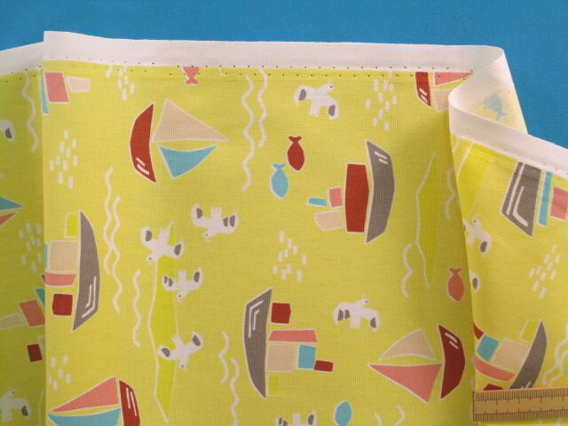 綿プリントオックス生地ヨット/さかな・イエロー（110cm幅　1m）