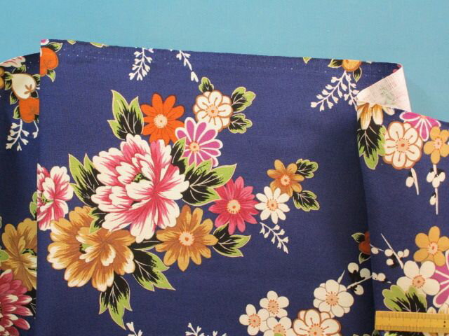 綿中厚ストレッチ生地花・青紫×オレンジ（130cm幅　1．5m）