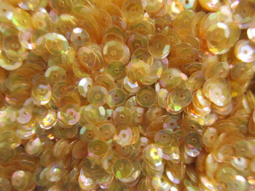 スパンコール 亀甲5mm(100g・10000枚)オーロラクリアオレンジべージュ スパンコール 亀甲5mm(100g・10000枚)オーロラクリアオレンジべージュ