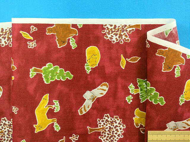 在庫処分綿プリント生地動物エンジ系×茶（105cm幅　2m）