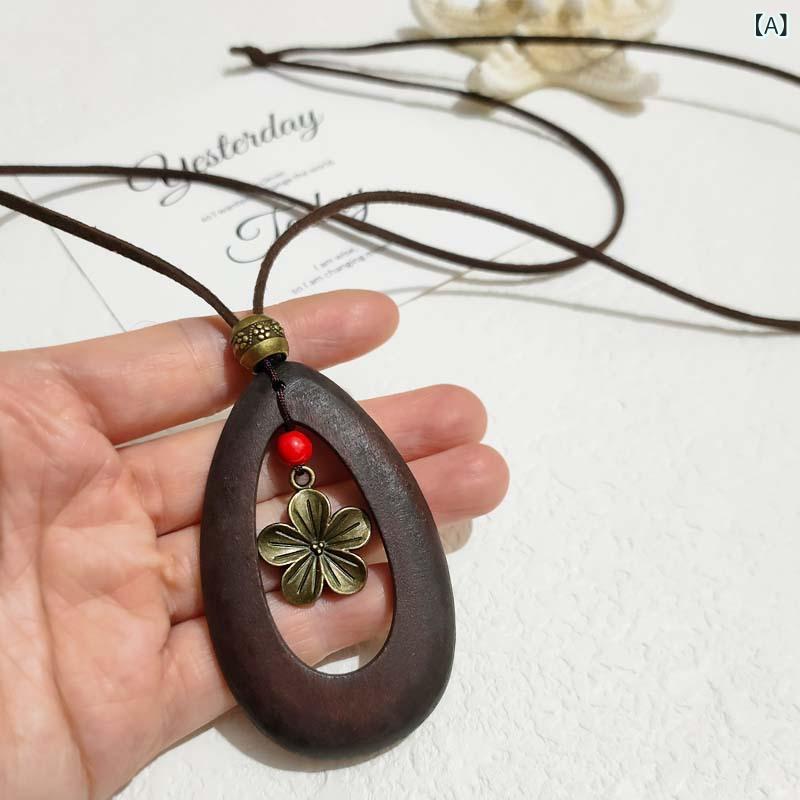 ネックレス レディース 木製 ウッド 合金 革紐 レザーコード レトロ ヴィンテージ ロング ペンダント リーフ 葉っぱ ドロップ型 エスニック ボヘミアン セーター ニット コーデ