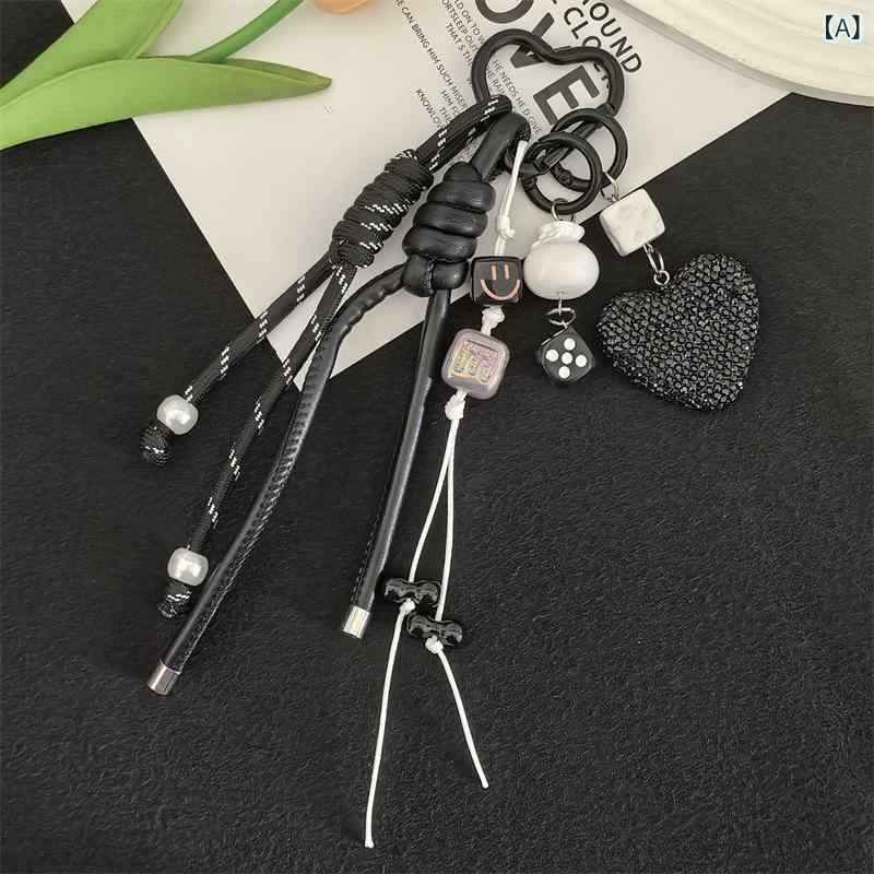 ・カテゴリ: キーホルダー・アクセサリーチャーム・スタイル: 現代アート・主な素材: 混合素材・カラー展開: ブラック、レッド、ピンク、パープル、ブルー