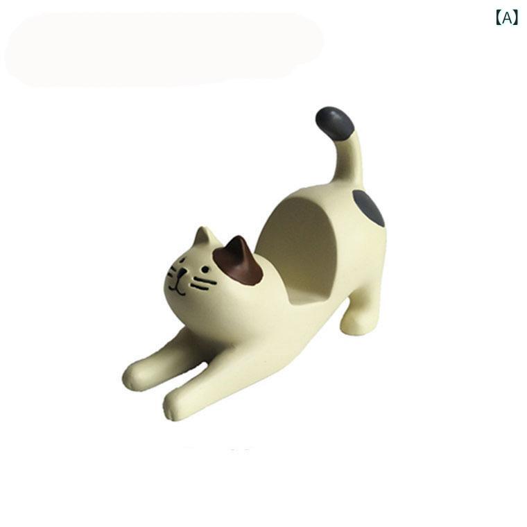 スマホスタンド 白猫 伸びをする 猫 スマートフォン タブレット両用スタンド 樹脂製 置き物 かわいい ..