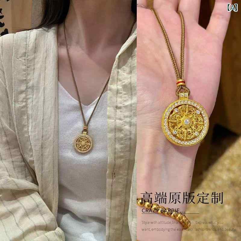 SWAROVSKI - ネックレス レディース 女性用 八宝羅針盤 ラウンド型 ジルコニア 合金製ペンダント 編み込みレザーコード ゴールドカラー ロングタイプ セーターチェーン 軽やか 高級感 レトロ エスニック 中国風 普段使い