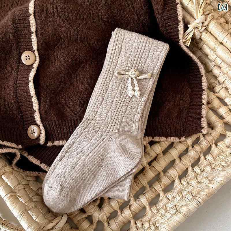 タイツ レギンス 女児 ベビー キッズ 子供 コーマ綿 コットン 春秋 無地 白 オフホワイト 黒 通気性 吸湿速乾 伸縮性 快適 シームレス 中厚手 普段使い お出かけ