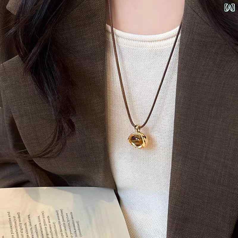 ・素材: 紐・加工方法: 電鍍・形状: 幾何学型・チェーンスタイル: 通常チェーン・ペンダント素材: タイガーアイ・周囲長: 31cm～40cm・カラー: タイガーアイ・流行要素: 楕円、四角形・スタイル: ・重量: 約5g・スタイル分類: 個性風潮・カテゴリ: ネックレス・対象: 男女兼用