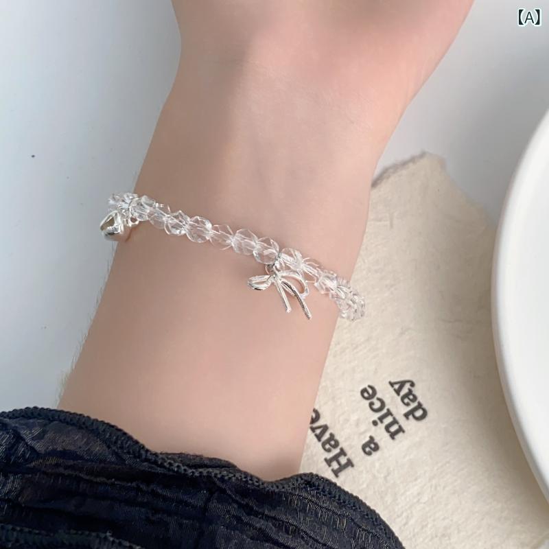 ブレスレット レディース かわいい 清楚 フェミニン リボン チャーム ビーズ ライトラグジュアリー 繊..