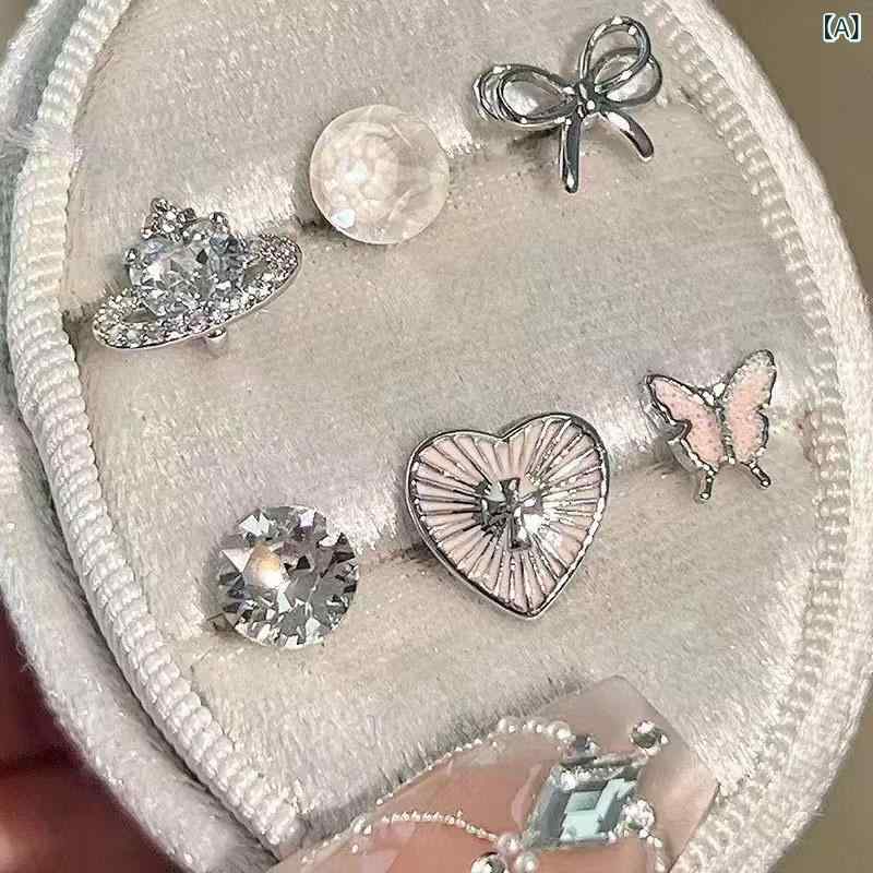 ピアス レディース かわいい キラキラ リボン ハート スタッドピアス 軟骨ピアス ヘリックス トラガス ..