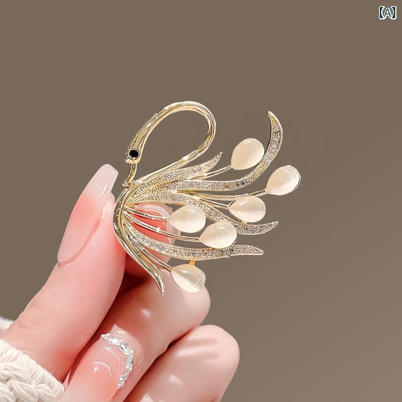 ブローチ レディース レトロ キャッツアイ 白鳥 スワン 欧米風 上品 エレガント 合金製 ラインストーン..