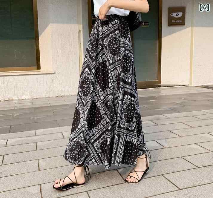 ・カテゴリ: スカート・主な素材: ポリエステル95%以上・スタイル: きれいめ通勤、上品・スカートの形: Aライン・スカート丈: ロング丈・柄: プリント・カラー展開: ブラック・サイズ展開: S、M、L、XL、XXL・伸縮性: なし