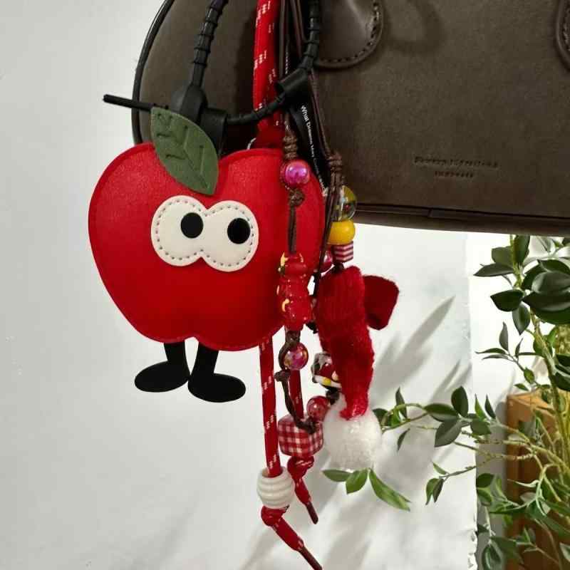 バッグチャーム かわいい 大きな目 リンゴ クリスマスツリー フェイクレザー カップル ペア 編み込み ..