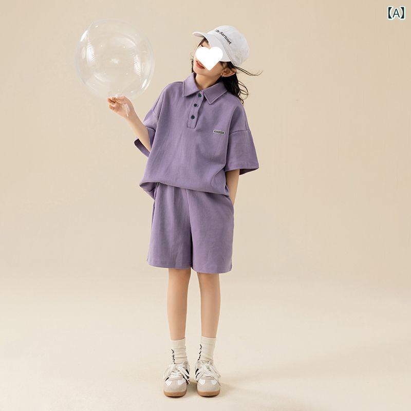 ・カテゴリ: 子供用セットアップ・対象性別: 女の子・スタイル: 韓国風・セット内容: トップス、ボトムス・セット点数: 2点セット・対象年齢: 8歳以上、140cm以上・袖丈: 半袖・フード: なし・ボトムス丈: 5分丈/ハーフパンツ・生地加工: ソフト加工・厚さ: 薄手・柄: 無地・デザイン要素: スポーツ、セットアップ、キャラクター、トレンド風・主な素材: ポリエステル混紡・素材割合: ポリエステル 75%・安全基準: B類・着用タイプ: プルオーバー・カラー展開: パープル、グレー・サイズ展開: 120cm、130cm、140cm、150cm、160cm、170cm