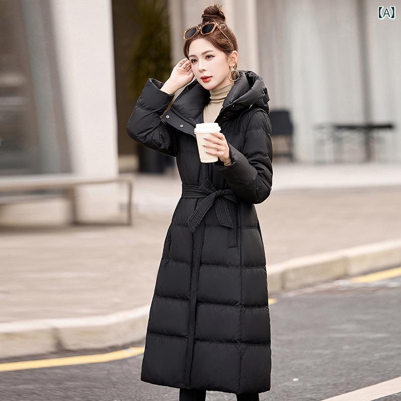 ダウンジャケット レディース 女性用 秋冬 韓国風 ウエストマーク フード付き ロング丈 膝下丈 ゆったり ビッグシルエット 厚手 防寒 暖かい 快適 ホワイトダックダウン アウター ポリエステル
