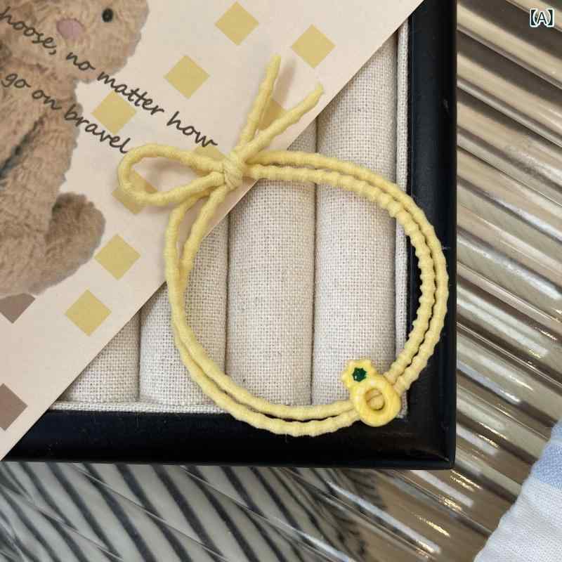 ・カテゴリ: ポニーテールヘアリング・素材: 布・加工技術: ハンドメイド・カラー展開: パイナップル柄、イチゴ柄、ニンジン柄、メロン柄・トレンド要素: パイナップル、イチゴ、ニンジン、フルーツ・フード・スタイル: 田園風、フレッシュ・スイート・タイプ: 高弾力