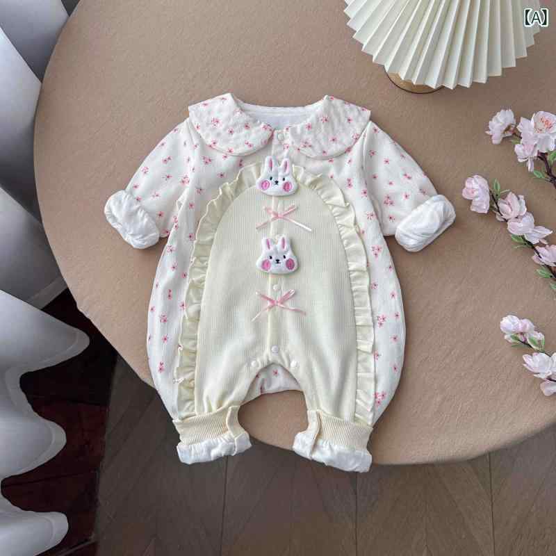 ・カテゴリ: ロンパース・対象年齢: 新生児 (0～1歳)・対象性別: 女の子・袖丈: 長袖・厚さ: 普通・主な素材: ポリエステル・開閉方法: シングルボタン・スタイル: プリンセス・カラー展開: ピンク、オフホワイト・サイズ展開: 66cm, 73cm, 80cm, 90cm