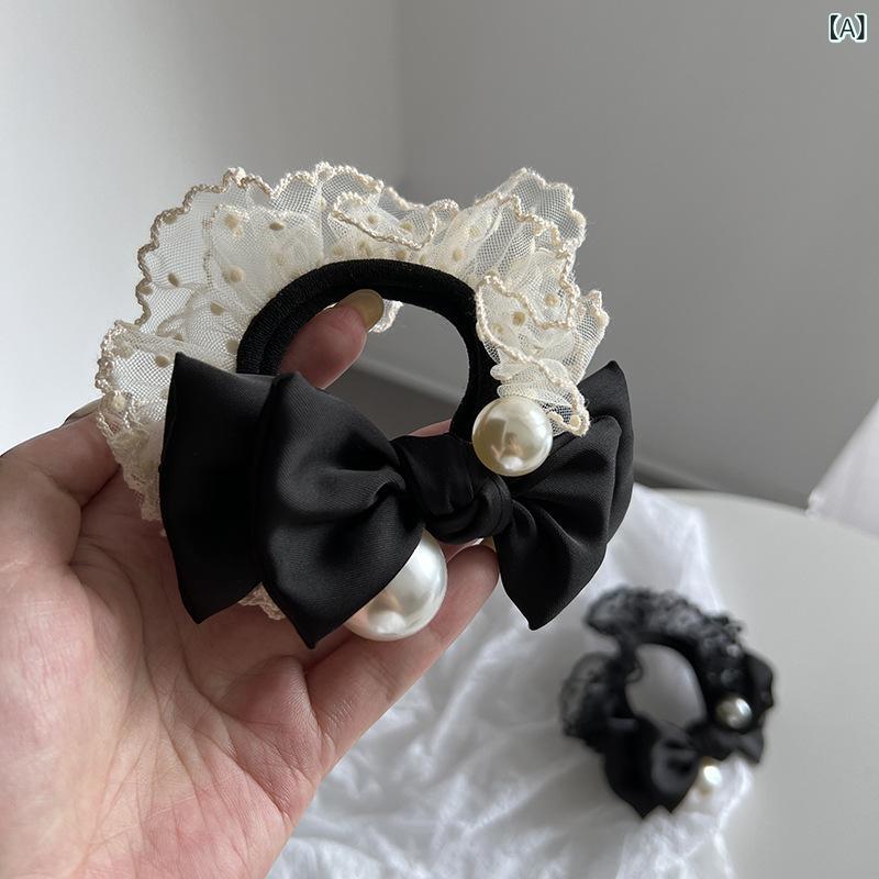 ・カテゴリ: ヘアアクセサリー・素材: 布・加工技術: り・カラー展開: ベージュ、ブラック・スタイル: リボンヘアゴム・スタイル分類: 爽やかでスウィート