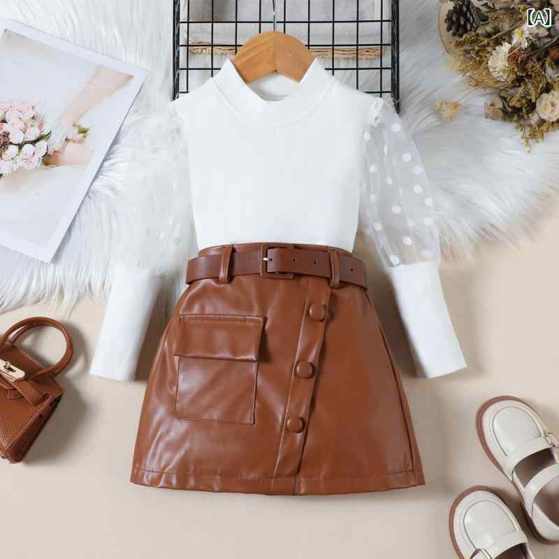 キッズ 女の子 セットアップ 春夏 長袖 コットン トップス 切り替え メッシュ袖 プルオーバー PUレザースカート 斜め ボタンデザイン ウエストベルト 無地 カジュアル ホワイト ブラック