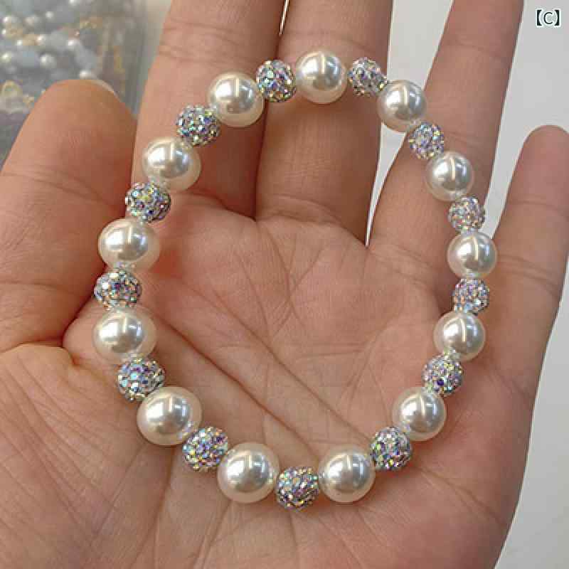 ブレスレット レディース ラッキーアイテム フェイクパール ジルコニアボール きらめく 伸縮コード 上品 繊細 こだわりデザイン 合金素材 普段使い オフィス カジュアル きれいめ