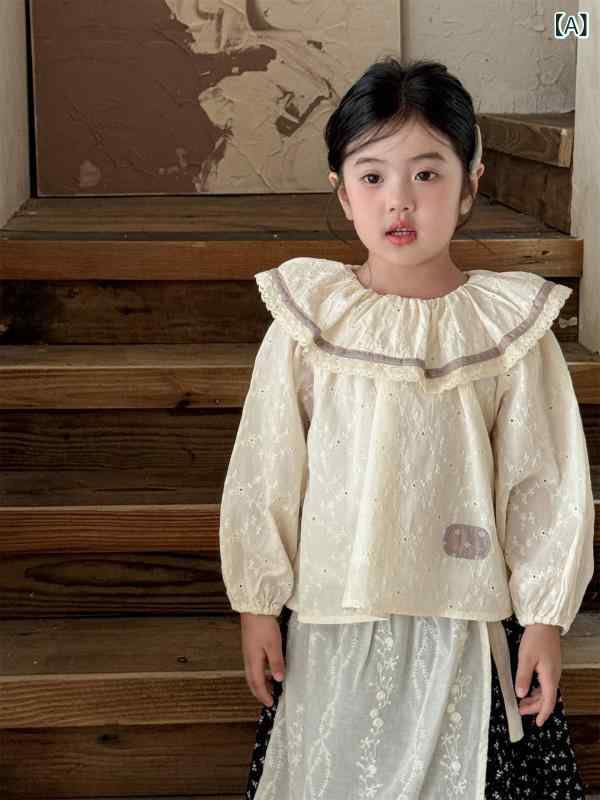 ・カテゴリ: キッズシャツ・性別: 女児用・ターゲット: キッズ（3-8歳向け）・対応身長: 100-140cm・スタイル: 韓国・襟型: 丸襟・生地加工: 柔らか加工・袖丈: 長袖・柄: 花柄・主な素材: 綿95%・カラー展開: ベージュ・サイズ展開: 90cm、100cm、110cm、120cm、130cm、140cm