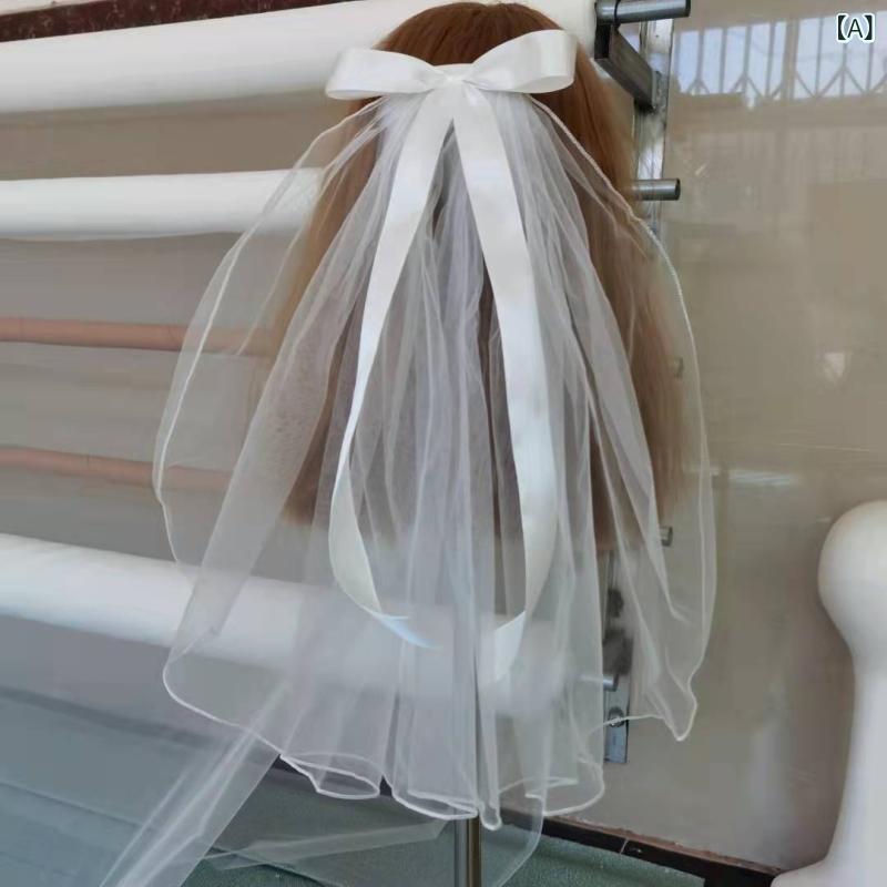 ヘッドドレス レディース 女性用 ブライダル ウェディング 花嫁 結婚式 披露宴 二次会 プリンセスベール ミニ丈 ショート丈 シングルレイヤー チュール スイス製 柔らかい リボン 蝶結び フォトウェディング 前撮り 記念撮影 白 ホワイト