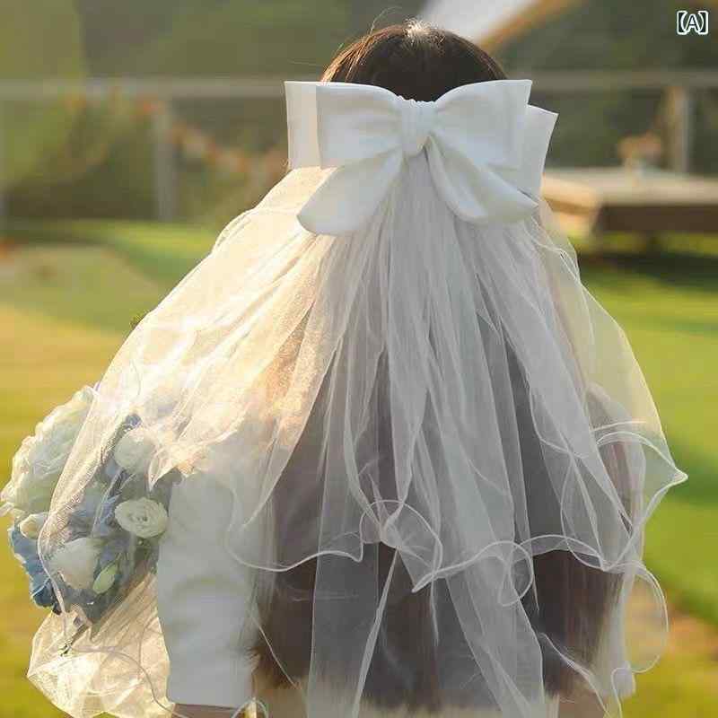 ヘッドドレス キッズ 女の子 子供用 大きめリボン 蝶結び 純白 パール付き ヘアクリップ 妖精風 かわい..