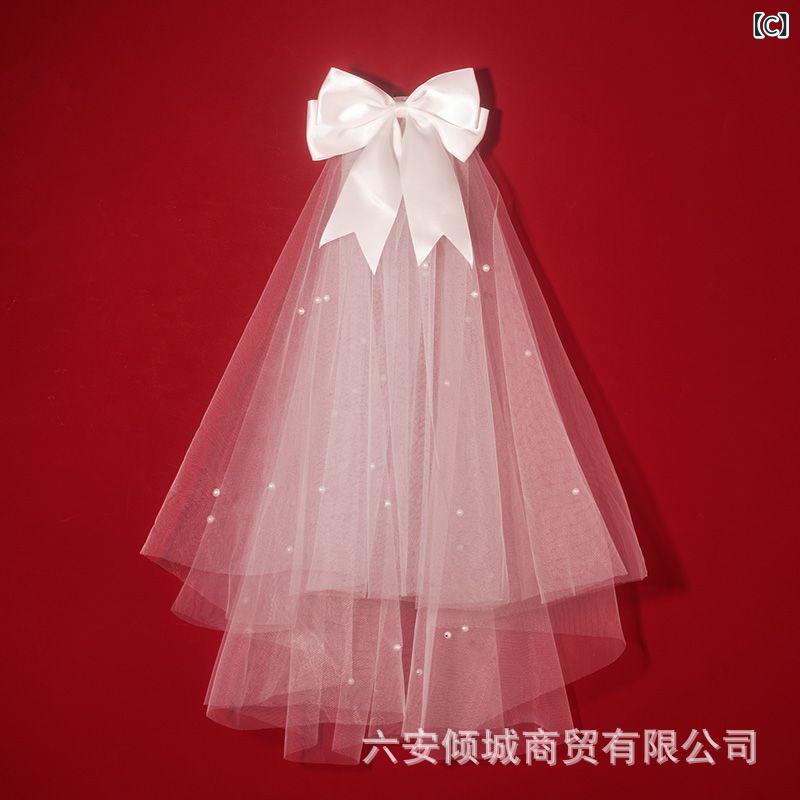 narukiのウェディングベール レディース プロポーズ 入籍 結婚式 婚約 ショート丈 シンプル 高級感 華やか 撮影小物 フォトウェディング 前撮り 後撮り チュール リボン パール スイート かわいい フェミニン｜アングル3