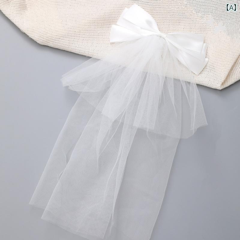 ウェディングベール 新婦 結婚式 ブライダル 蝶結び リボン ヘッドアクセサリー 婚姻届 フォトウェディング 前撮り 優雅 エレガント 布製 ハンドメイド 純白 透け感 チャペルスタイル