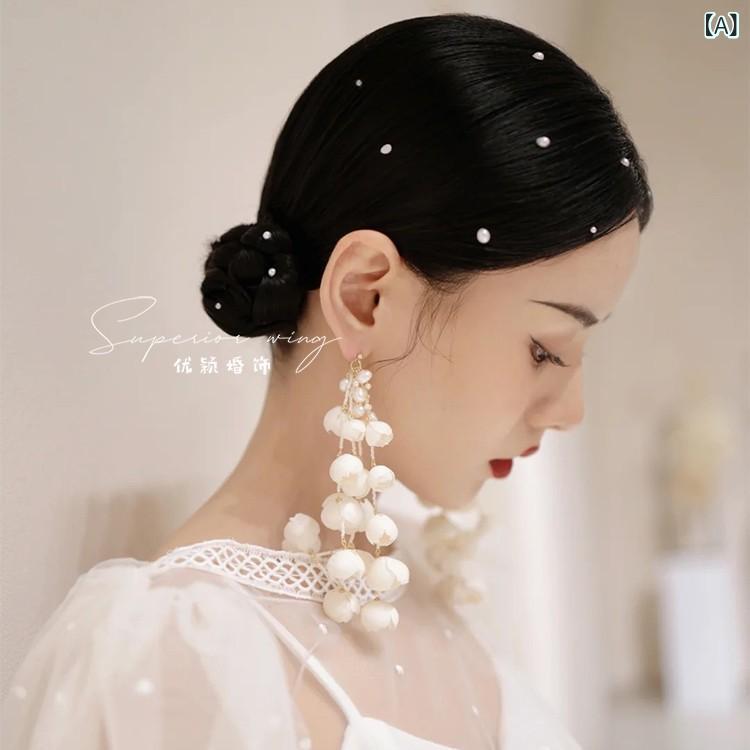 ピアス イヤリング レディース 日韓風 スズラン 花つぼみモチーフ ラインストーン ハンドメイド 白 タ..